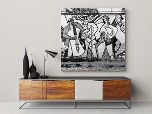 Patterned clothing and musical instruments across a weathered Cuban wall