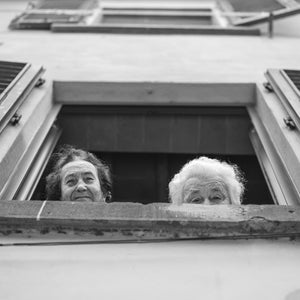 Tuscan town festival scene in black and white