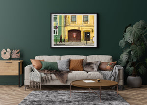 Weathered double doors on Brasov's city street