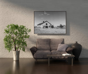 Quiet Nebraska farm scene with an aging stone building