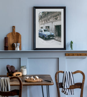 Faded beauty of old American car in Cuba street scene
