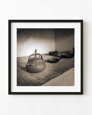 Old pressure cooker on a rustic kitchen surface in Trinidad, Cuba