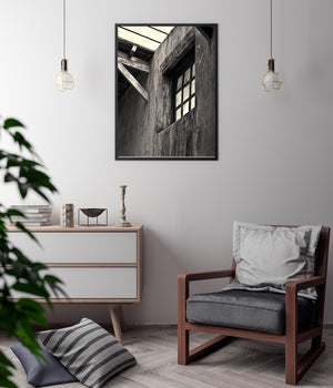 Black and white architectural detail of an aging prison interior