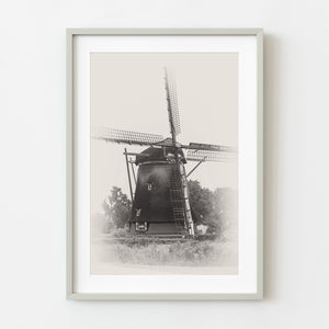 Sepia-toned Dutch windmill photo