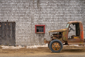 Rural Canadian barn with small red windows