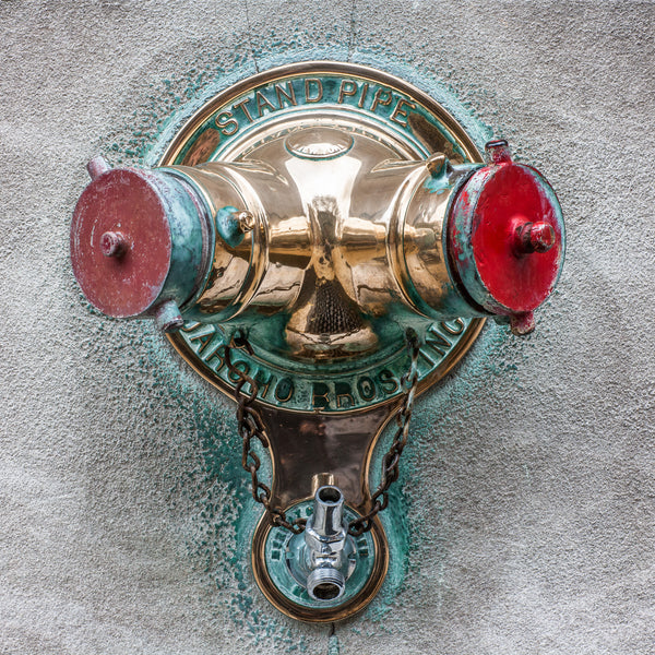 Antique New York City brass fire hose nozzle detail