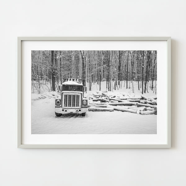 Abandoned logging truck in snow