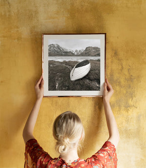 Timeless view of a vintage rowboat on Vikvatnet Lake, Norway