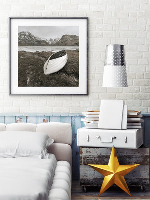 Weathered rowboat amidst the natural beauty of Norwegian lake