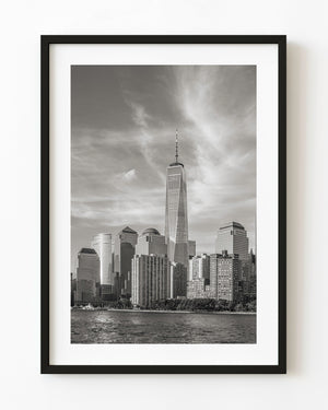 One World Trade Center rising above the Hudson River in monochrome