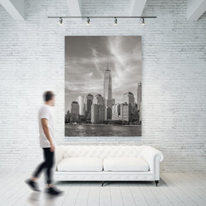Sunlit glass towers lining the Lower Manhattan waterfront