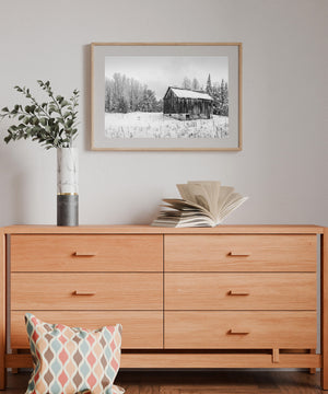wooden barn structure in snowy forest setting Ontario