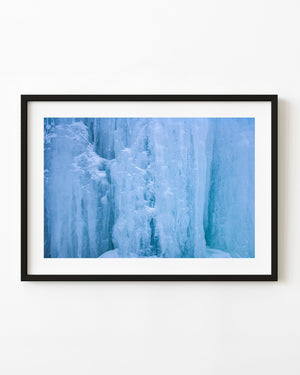 Blue ice columns with white frost in an Ontario winter close-up