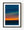 Orange sunset light along a dark ocean horizon beneath deep blue clouds