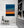 Dark ocean beneath layered blue and orange evening sky