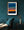 Blue twilight sky above a bright orange ocean sunset