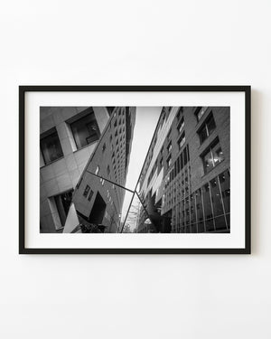 Angled Oslo building facades and mirrored windows photographed in black and white