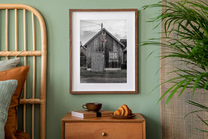 Rainy coastal shed with red maple leaf emblem