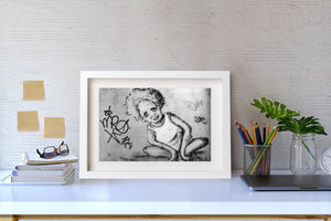 Black and white Cuban wall mural with a child’s face and weathered paint