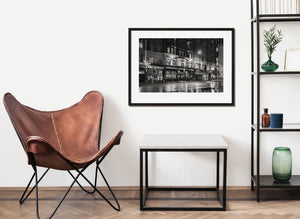 Reflective wet street outside London pub