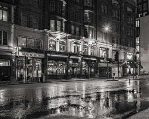 Monochrome cityscape of London storefronts