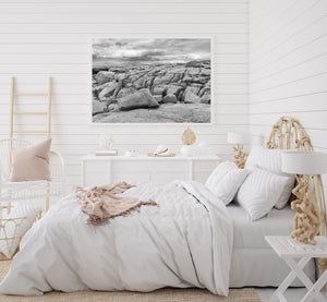 Black and white landscape of fractured granite beside the Atlantic