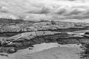 Low granite ledges surrounding pools on the Nova Scotia coast