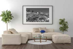 Historic lighthouse buildings on the rugged Pemaquid Point shore