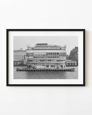 Pier 57 waterfront façade with Marine and Aviation lettering in black and white