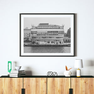 Monochrome architectural photograph of Pier 57 and surrounding waterfront buildings