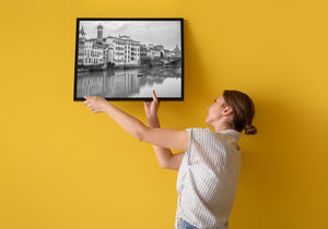 Florence skyline framed by Ponte Santa Trinita bridge