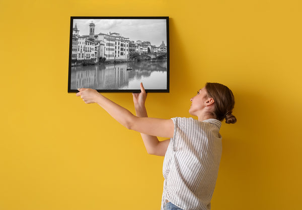 Florence skyline framed by Ponte Santa Trinita bridge