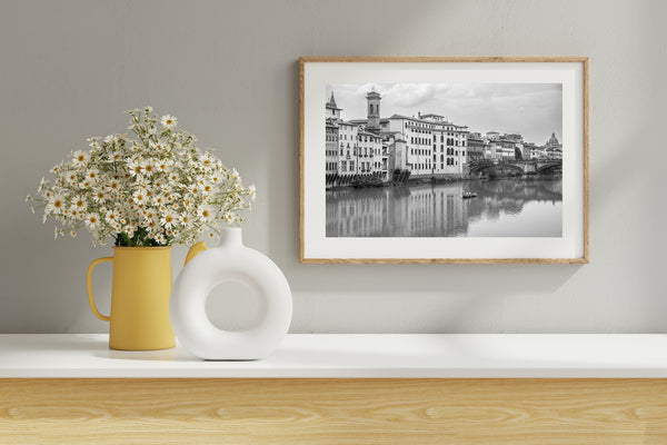 Sunset view of Florence with Ponte Santa Trinita bridge in foreground