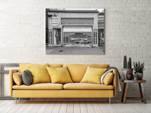Route 66 mural showing the rear of a Pontiac inside an old garage