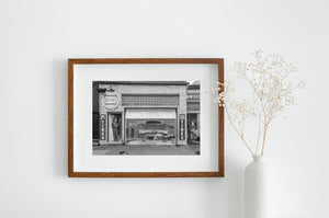 Monochrome street photograph of a nostalgic garage mural in Pontiac Illinois