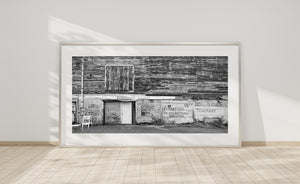 Monochrome architectural photograph of Portland’s weathered building and parking signs