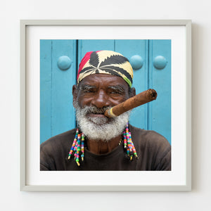 Man smiling with cigar in Havana
