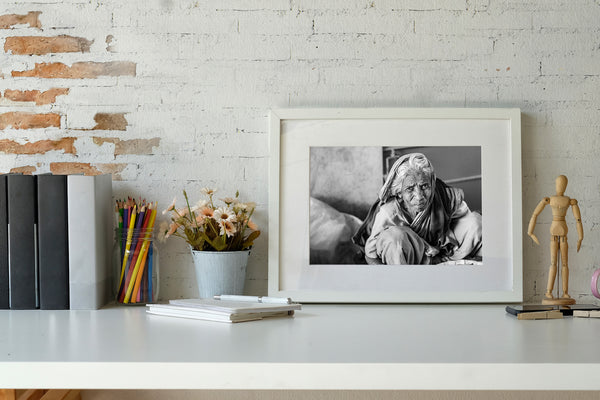 Black and white portrait of elderly woman in sari