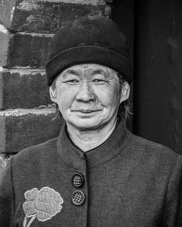 Portrait vendor working on the Great Wall of China fine art photographic print