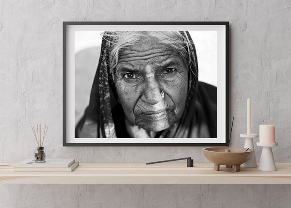 Elderly woman with headscarf wall art