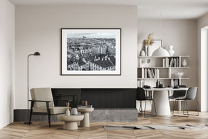 Black and white Prague skyline with cathedral spires on the distant hill