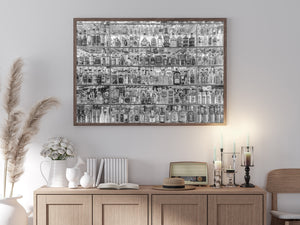 Black and white photograph of assorted spirits and repeating glass reflections