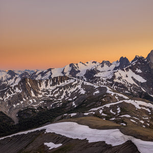 Snowfields and jagged peaks in the British Columbia Purcell Mountains