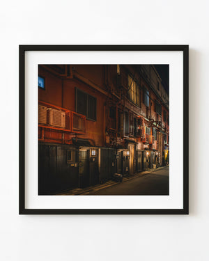 Tokyo night alley with warm architectural lighting
