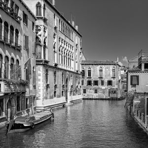 Venetian canal architecture in monochrome daylight