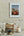 Vertical colour photograph of an old red fishing boat in Cobh harbour