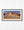 Red sandstone cliffs streaked with dark desert varnish beneath a clear blue sky
