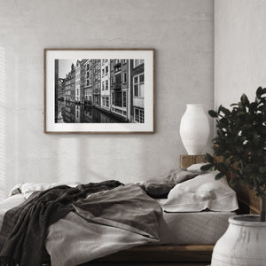 Canal buildings in Amsterdam with symmetrical reflections