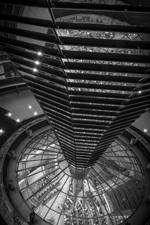 Looking down through Berlin’s Reichstag dome toward the parliamentary chamber