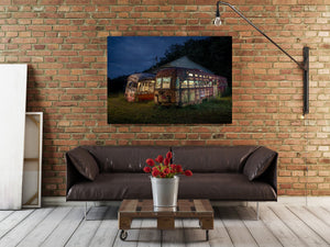 Overgrown vegetation encasing an idle trolley, nature slowly reclaiming the man-made relic, blending past human endeavor with the present natural world.